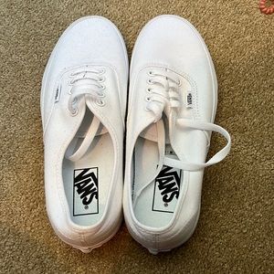 Selling these new white vans never worn